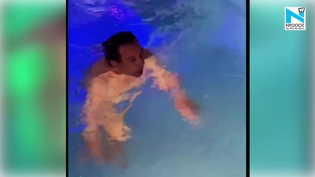 Dharmendra does water aerobics in swimming pool, watch