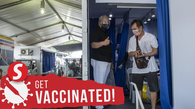 2,000 wholesale market workers happy to get first jabs under FT Ministry's mobile truck initiative