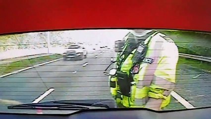 Watch as motorway driver narrowly misses West Yorkshire Police officer (Video: WYP)