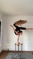 Girl Shows Impressive Flexibility Skill While Balancing On Single Hand And Holding an Umbrella