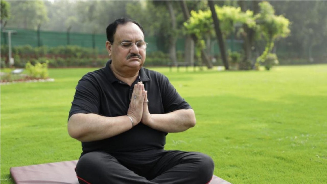 International Yoga Day: JP Nadda and his wife p...