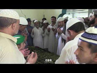 جنازة لأحد ضحايا زلزال باكستان الذي أودى بحياة 22 شخص