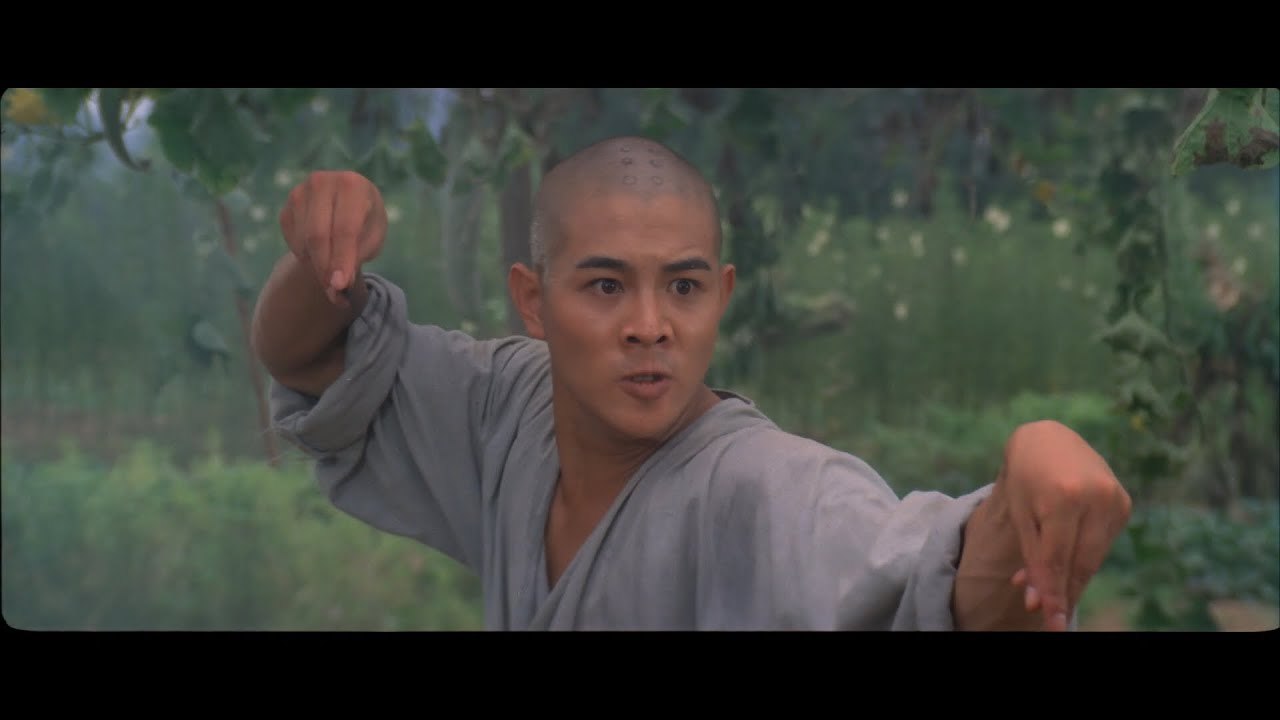Боевые искусства шаолиня фильм 1986. Джет ли шпагат. Джет ли боевые искусства шаолиня. Боевые искусства шаолиня фильм 1986. Вокруг света шаолинь.