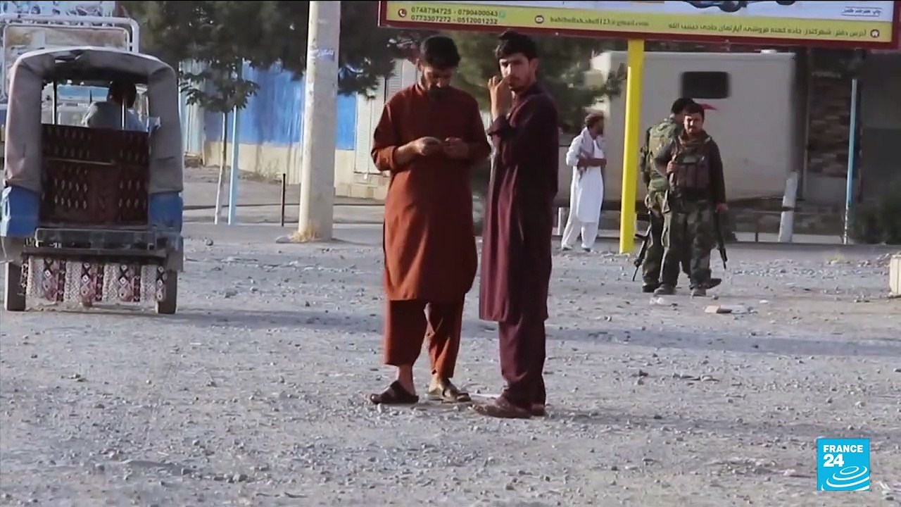 Taliban take key Afghan district, adding to string of gains