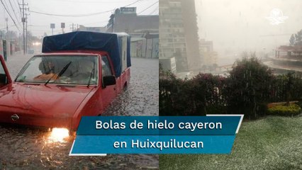 Quedan autos sumergidos por lluvias en Edomex