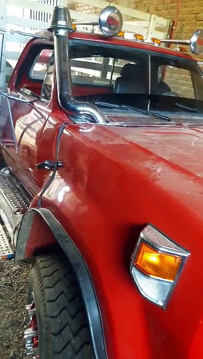 8 year old boy driving a dodge 600 truck
