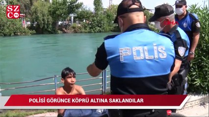 Sulama kanalında yüzerken polisi görünce köprü altına saklandılar