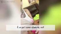 Il papà che allatta sua figlia