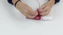 Come realizzare un porta-tovagliolo per addobbare la tavola a Natale