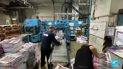 Tears and cheers as Hong Kong's Apple Daily prints last edition