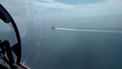 Russian military releases footage  it claims shows it chasing of British destroyer out of Crimea waters with warning shots and bombs