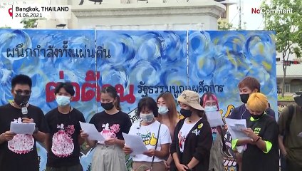 Thai protesters hold candlelight vigil to mark Siamese Revolution anniversary