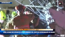 Niño siendo rescatado de los escombros del edificio derrumbado en Miami