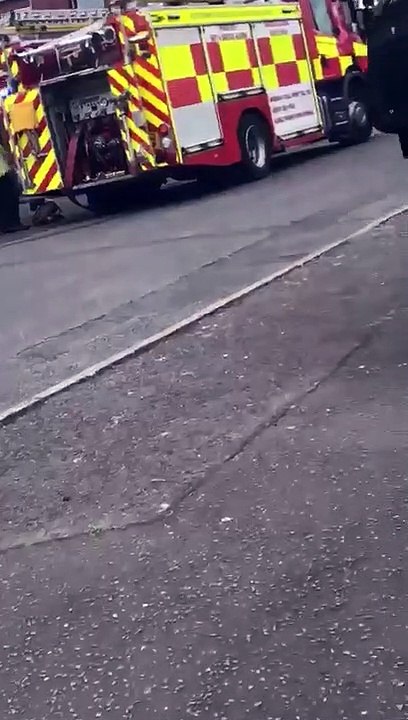 Smoke billows out of house in Northampton as firefighters battle to put out flames