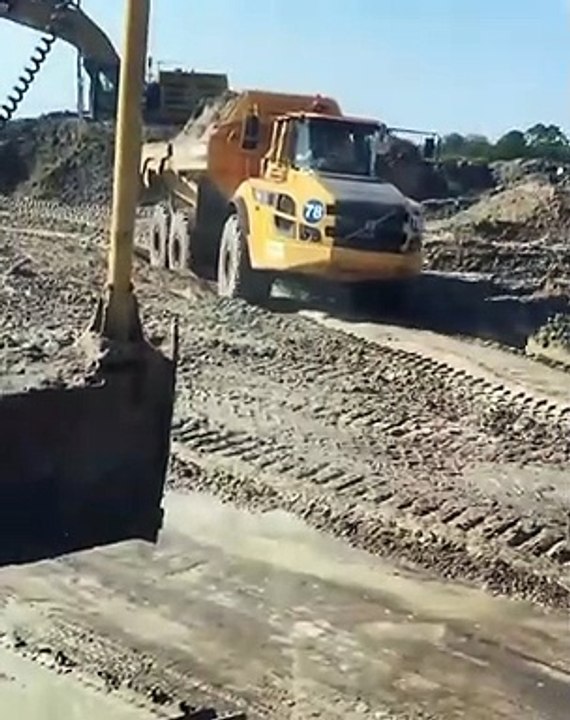 Extreme powerful truck working in mud.