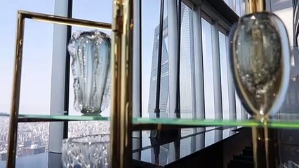 Up in the clouds: Shanghai opens world's highest luxury hotel