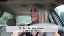 Une femme conduit et rit sur les clichés sur les femmes au volant