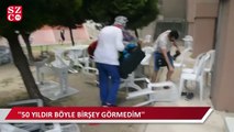 İzmir’de aniden değişen hava kabus yaşattı masa sandalyeler havaya uçtu, insanlar kaçacak yer aradı