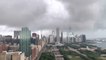 Tornado sirens sound over the Chicago skyline