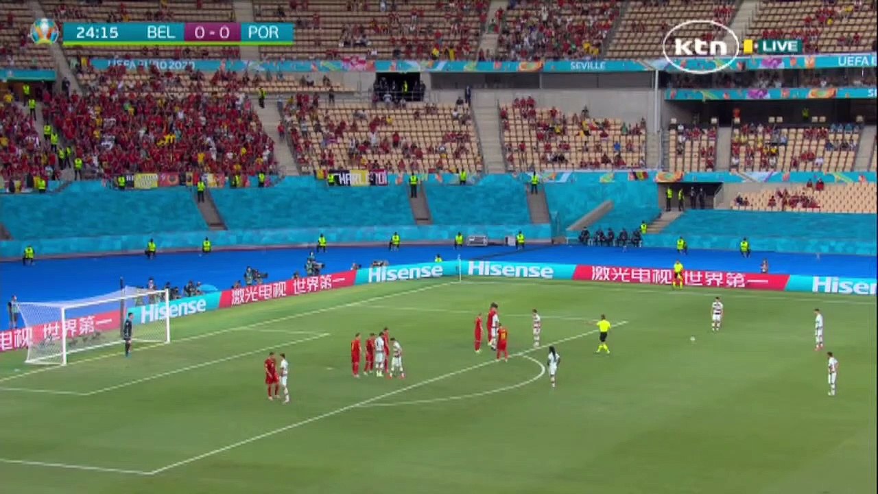 Christiano Ronaldo sends freekick towards left post of the Belgian side but stopped by a diving goalkeeper