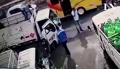 Would Be Robber Gets Hit With A Gas Cylinder By An Utility Worker