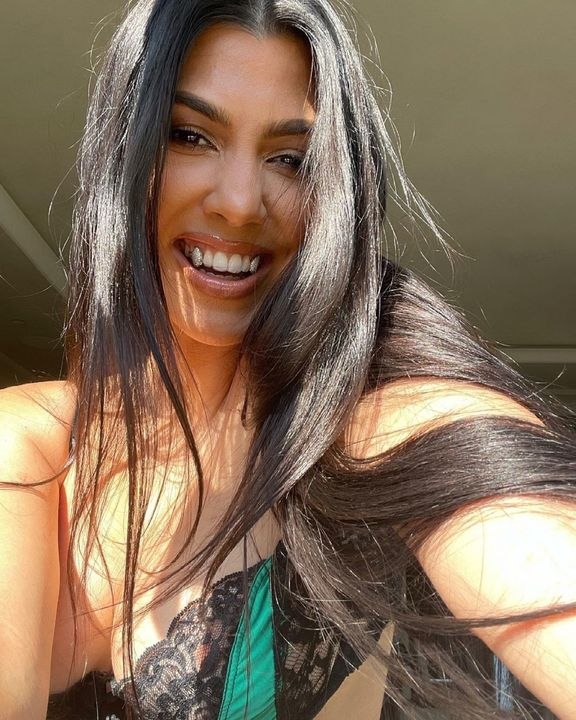 Kourtney Kardashian Paired Her Vintage Dior Bra with Diamond Vampire Fangs