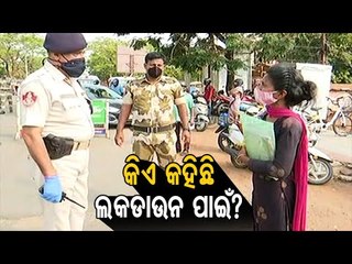 Woman Argues With DCP Security Nirmal Satpathy During Weekend Shutdown In Bhubaneswar