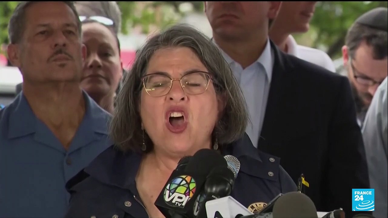 Rescue workers make slow progress at Florida building collapse