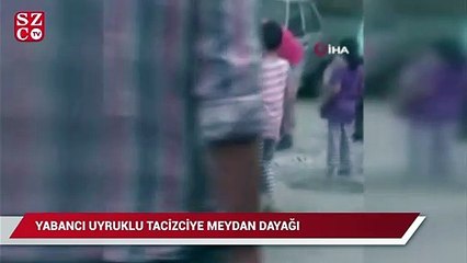 Kadının fotoğrafını çeken yabancı uyruklu şahsa sokak ortasında dayak