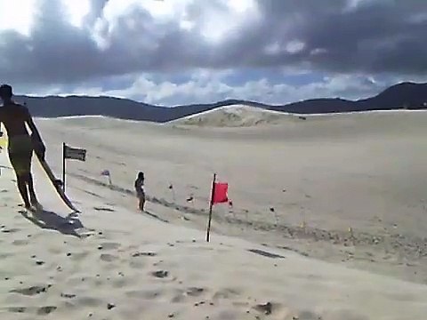 SURF NA AREIA DAS DUNAS DE FLORIANÓPOLIS
