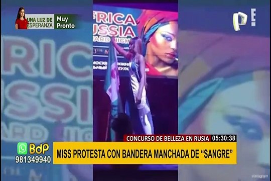 Certamen de belleza en Rusia: Miss protesta con bandera manchada de ‘sangre’