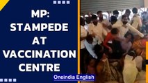 MP: Stampede-like situation after people rush into vaccination centre | Watch | Oneindia News