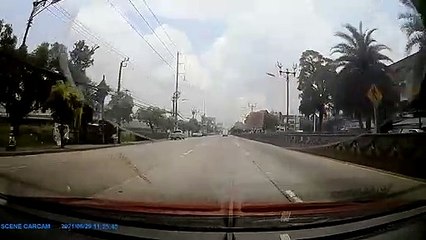 Motorcycle Runs Out of Room as Traffic Stops