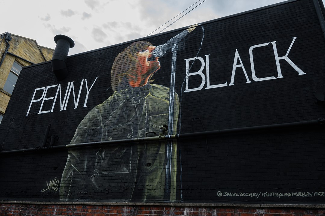 Timelapse of Liam Gallagher mural painted on Penny Black's wall