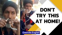 Man puts snake in nose, pulls it out of his mouth in viral video | Oneindia News