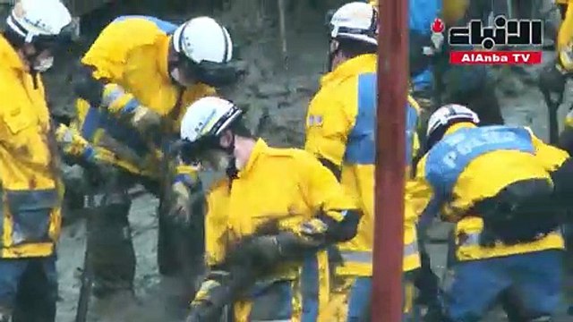 مسعفون يبحثون تحت المطر عن ناجين بعد كارثة انزلاق التربة في اليابان