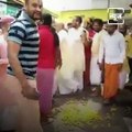 Video Of Pandit Throwing Ladoos On The Road Goes Viral