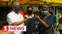 50 families receive aid in Bandar Tun Razak