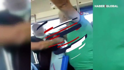 Maskeyi burnunun altına takan kişi, çenesine takanı azarladı