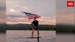 Facebook CEO Mark Zuckerberg celebrates US Independence Day by waving American flag on surfboard