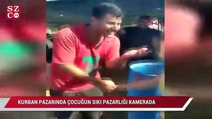Kurban pazarında çocuğun sıkı pazarlığı kamerada