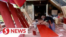 Indonesian coffin maker overwhelmed with orders as Covid-19 surges