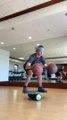 Man Displays Impressive Basketball Dribbling Skills While Standing Atop Balancing Board Blindfolded