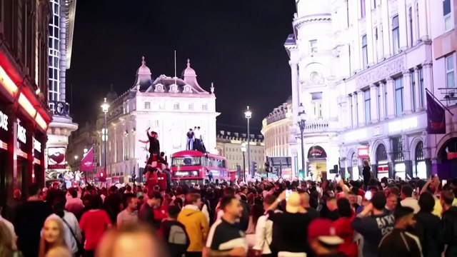 Ecstatic England fans celebrate 2-1 win against Denmark late into the night in central London as Euros 2020 final beckons