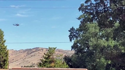 Helicopter drops water on Arosa Fire in Tehachapi