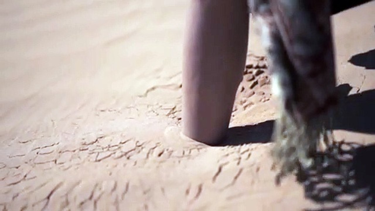 Person steps in the sand
