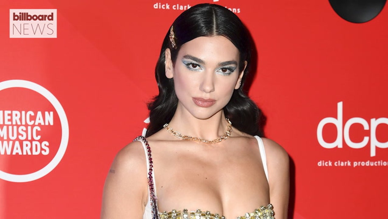Dua Lipa Sued for Sharing Paparazzi Photo of Herself on Instagram | Billboard News