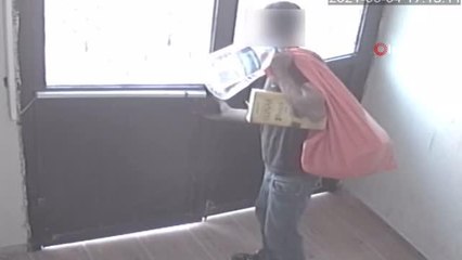 Apartmanın bodrum katından otomobil malzemesi çalan şahıs kamerada