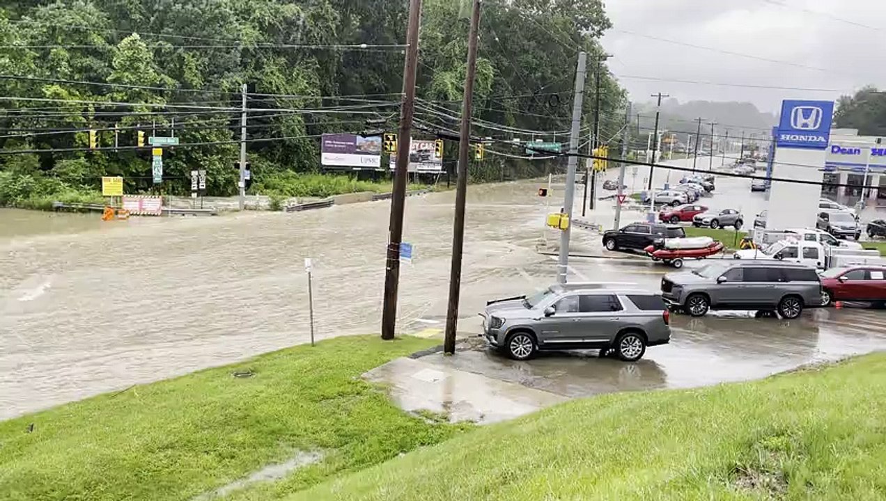 Road Turns Into Fast Flowing River During Flood