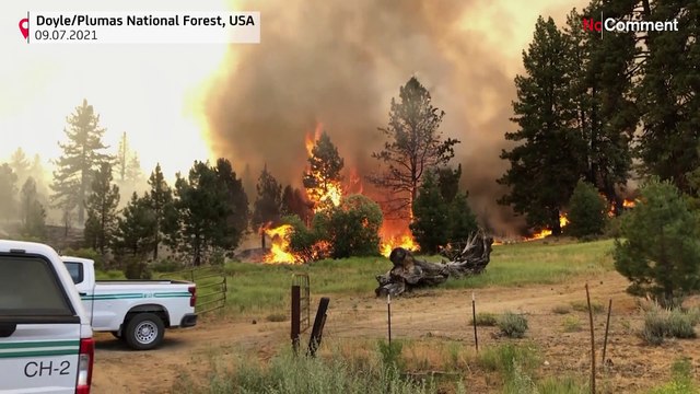 California fires advance as heat wave covers West